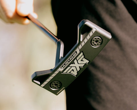 Close-up of a putter with a blurred background