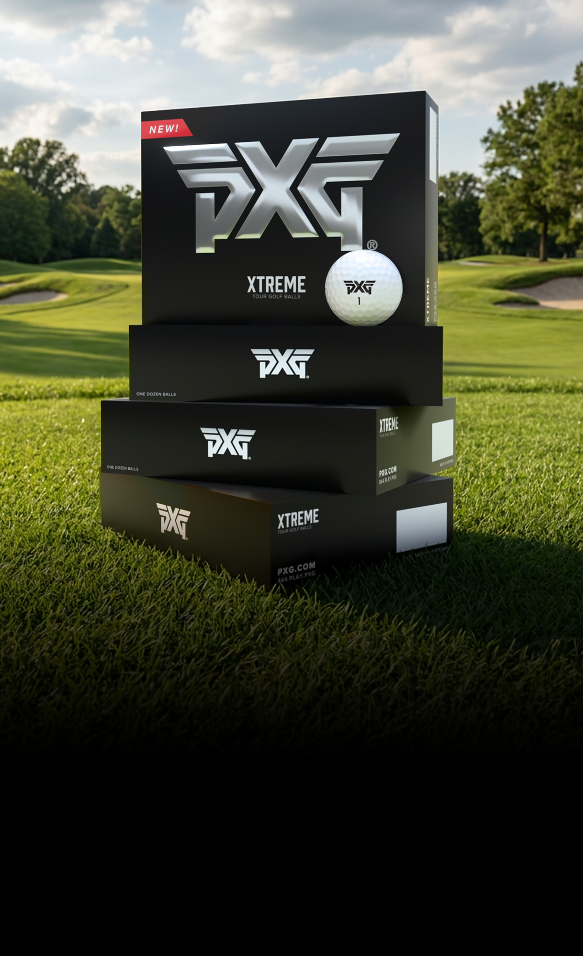 Boxes of PXG golf balls stacked on top of eachother on a golf course