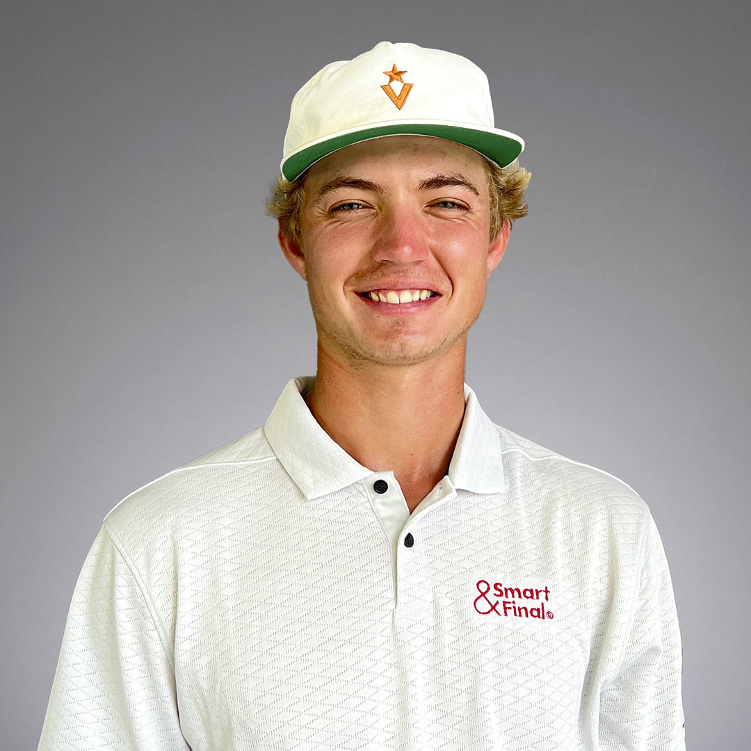 Pro Nathan Petronzio smiling against a gray background.