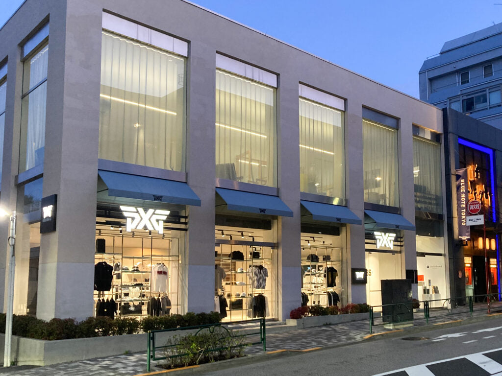 Modern building exterior with store front and visible brand logos